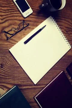 Toned table write hand top view various vintage elements on old worn backg... Foto stock