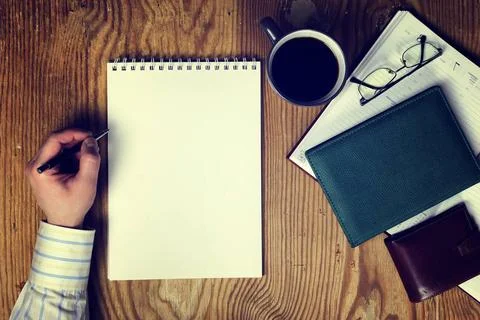 Toned table write hand top view various vintage elements on old worn backg... Stock Photos