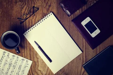 Toned table write hand top view various vintage elements on old worn backg... Foto stock