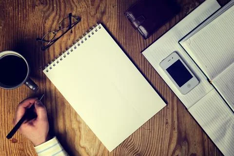 Toned table write hand top view Foto stock