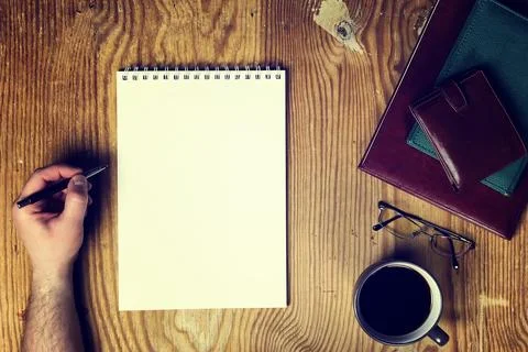 Toned table write hand top view Stock Photos
