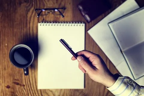 Toned table write hand top view Stock Photos
