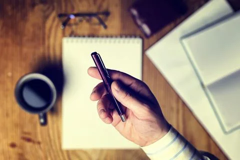 Toned table write hand top view Foto stock