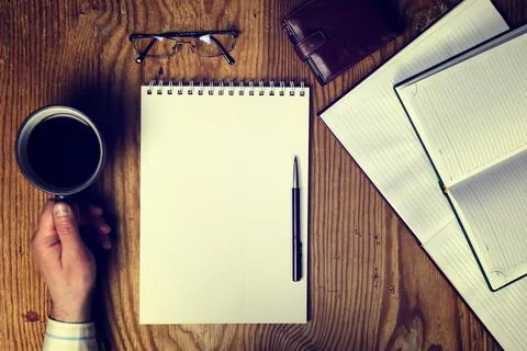 Toned table write hand top view Foto stock