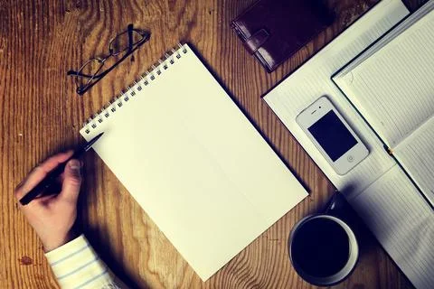 Toned table write hand top view Stock Photos