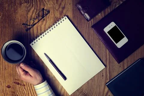 Toned table write hand top view Foto stock