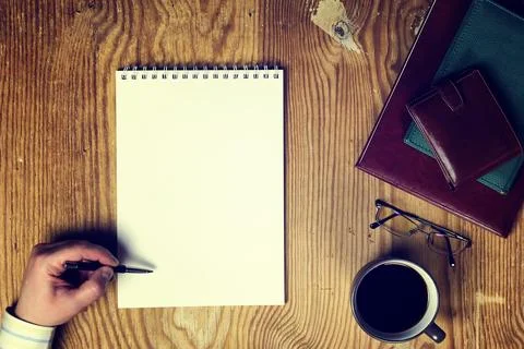 Toned table write hand top view Foto stock