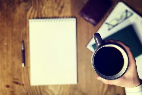 Toned table write hand top view Stock Photos