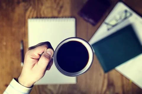 Toned table write hand top view Foto stock
