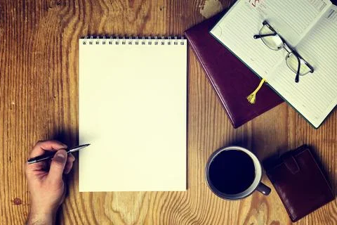 Toned table write hand top view Stock Photos