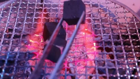 Tongs turning coal Stock Footage 159646070