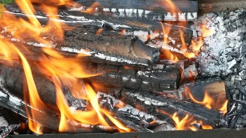 Tongue of flame over firewood Stock-Footage 87948827