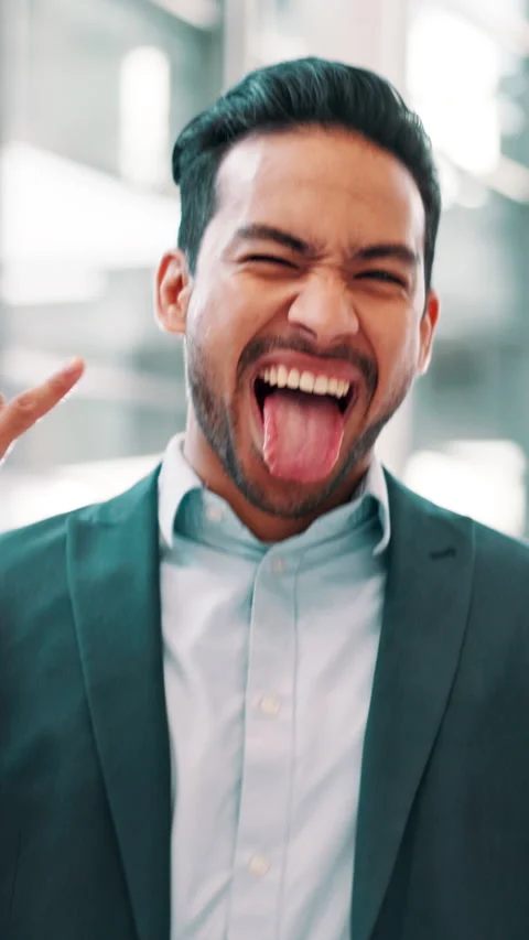 Tongue out, crazy and face of businessman in office with funny, silly or goofy Stock Footage 307672018