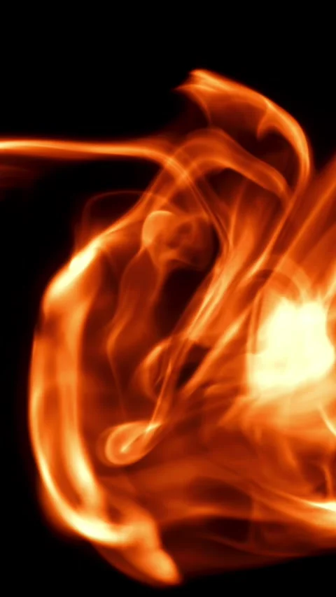 Tongues of bright fire on a black background. Filmed on a high-speed camera at Stock Footage 335364046