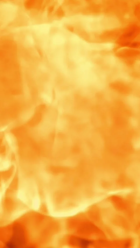 Tongues of bright fire on a black background. Filmed on a high-speed camera at Stock Footage 335381865