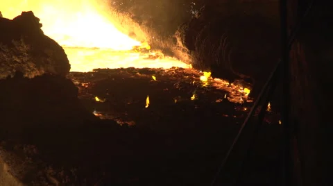 Tongues of fire on the surface of the slag Stock Footage 51926959