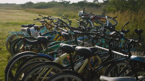 Tons of Bikes chained up to one another during sunset. Stock Footage 133510859