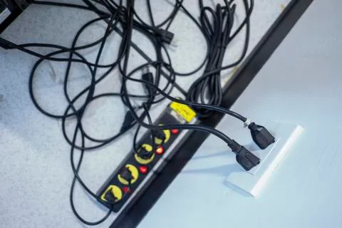 Too many plugs in a socket Stock Photos