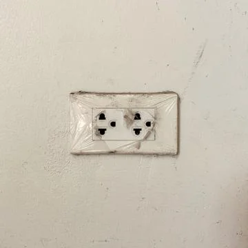 Too many plugs in a socket Stock Photos