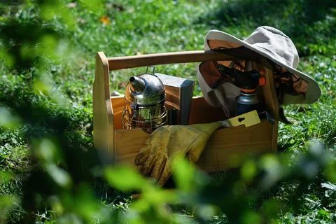 A tool of the beekeeper. Everything for a beekeeper to work with bees. Smoker, a Stock Photos