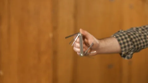 Tool being placed in frame Stock Footage 121012711