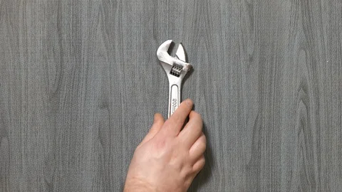 Tool being placed in frame Stock Footage 121013396