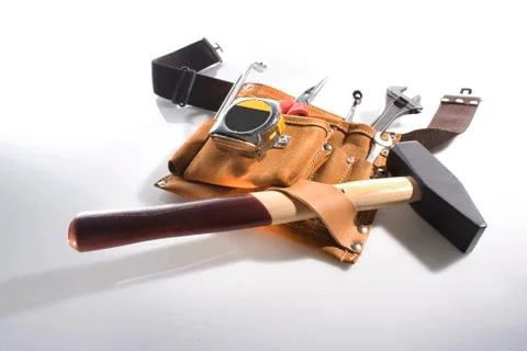 Tool belt with different tools on a white background Stock Photos