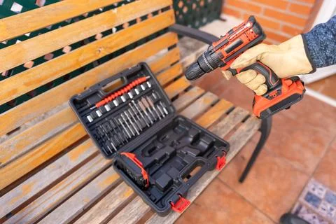 Tool case with drill and screwdriver with batteries to DIY at home. Stock Photos