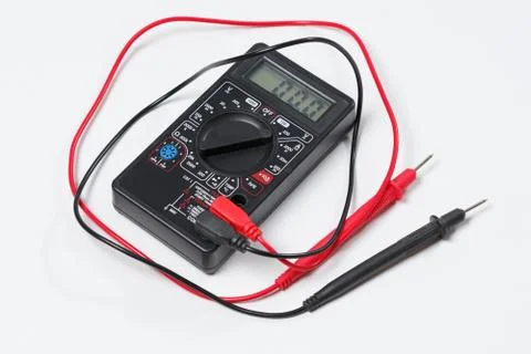 Tool for checking electrical circuits. Digital multimeter on white background Stock Photos