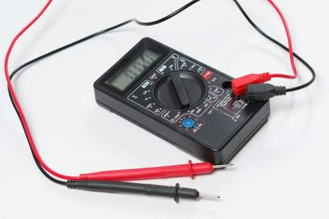 Tool for checking electrical circuits. Digital multimeter on white background Stock Photos