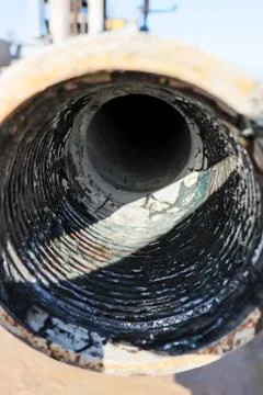 Tool for drilling rig. Pipes for deep drilling. Stock Photos