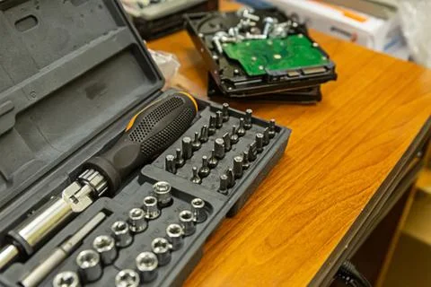 Tool kit in a box interchangeable iron bits for screwdriver and hdd, selectiv Stockfoto's