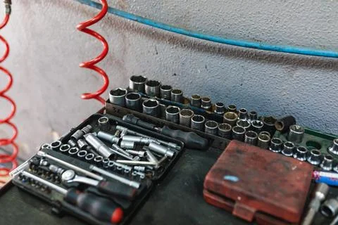 Tool kit in a car workshop. Concept of automobile mechanics. Stock Photos