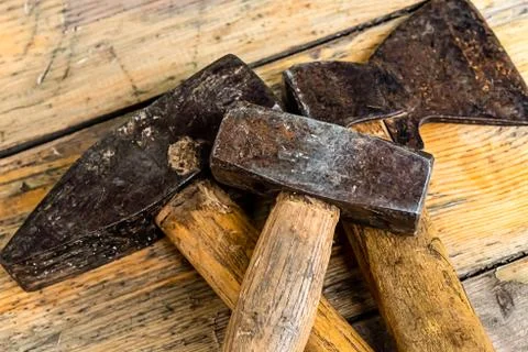 The tool kit consists of the axe of the hammer of heavy old construction set Stock Photos