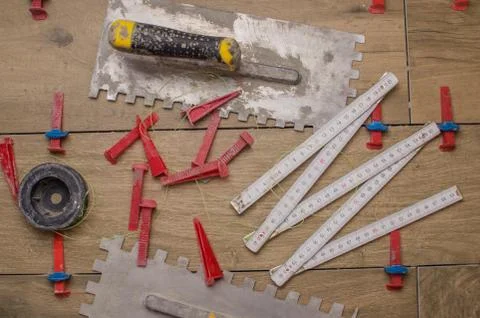 A tool for laying ceramic tiles in the form of a tree.Trowel, toothed spatula Stock Photos