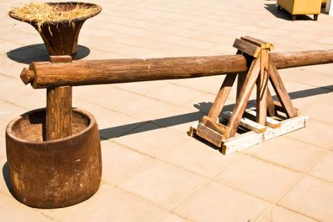 Tool for pounding rice. Stock Photos