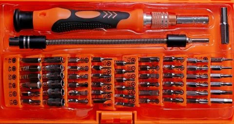 Tool set bits screwdrivers hex wrenches extension cord Stock Photos