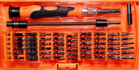 Tool set bits screwdrivers hex wrenches extension cord Stock Photos