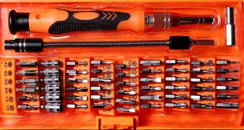 Tool set bits screwdrivers hex wrenches extension cord Stock Photos