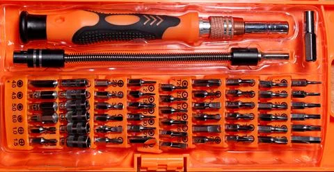 Tool set bits screwdrivers hex wrenches extension cord Stock Photos