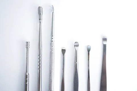 Tool set for cleaning ears isolated on a white background. Stock Photos