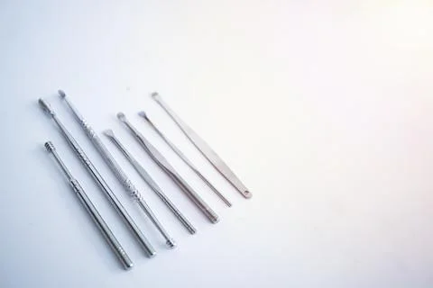 Tool set for cleaning ears isolated on a white background. Stock Photos