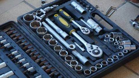 Tool set featuring various sockets, wrenches, and ratchets organized neatly.. Stock Photos