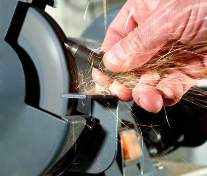 Tool sharpening Stock Photos