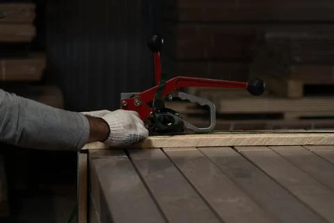 A tool used to install ties in a workshop using hand pressure Stock Photos