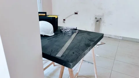 Toolbox, construction gloves, helmet and ruler on a trestle table Stock Footage 201464019