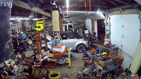 Toolbox Falls and Damages Classic Car, Bristol, Connecticut, USA - 06 May 2025 Stock Footage 308487589