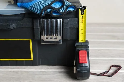 Toolbox with Measuring Tape and Work Gloves Stock Photos