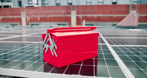 Toolbox, solar panel and sustainability outdoor on rooftop with electrician 動画素材 316763049