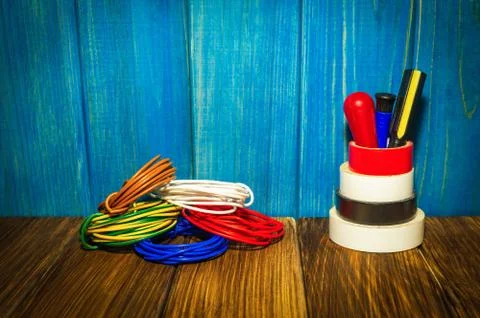 Tools and accessories used in electrical installations. Stock Photos